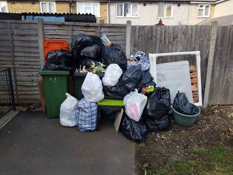 Crew sorting items during a Brockley house clearance for recycling and reuse